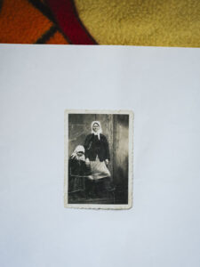 A historic photo on a white background shows Anna Šapovalova with her mother.
