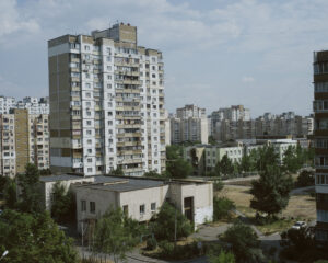 A cityscape with many apartment blocks